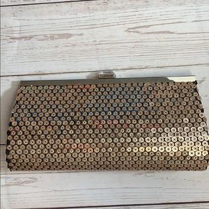 Rose gold sequin clutch